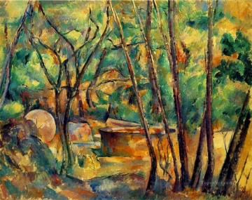  Molino Arte - Piedra de molino y cisterna bajo los árboles Bosque de Paul Cezanne